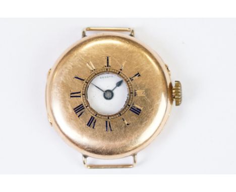 An antique hallmarked 18ct gold cased half hunter wristwatch, maker marked for Patek Philippe &amp; Co, Geneve. 