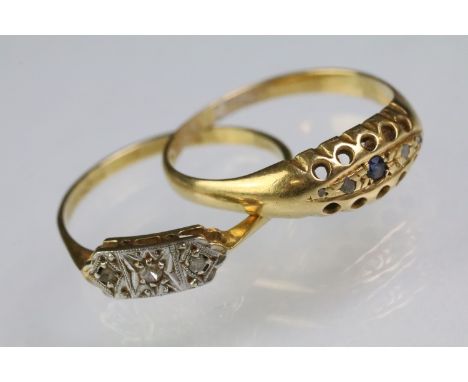 Two 18ct gold rings to include an 18ct gold and platinum diamond set panel ring (marked 28ct &amp; plat, size O), and a hallm