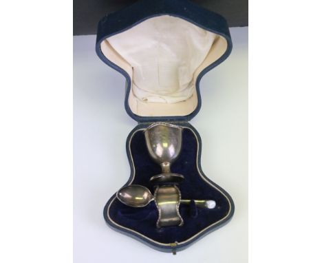 Early 20th Century silver hallmarked christening set comprising of egg cup and napkin ring housed in fitted case. Egg cup hal