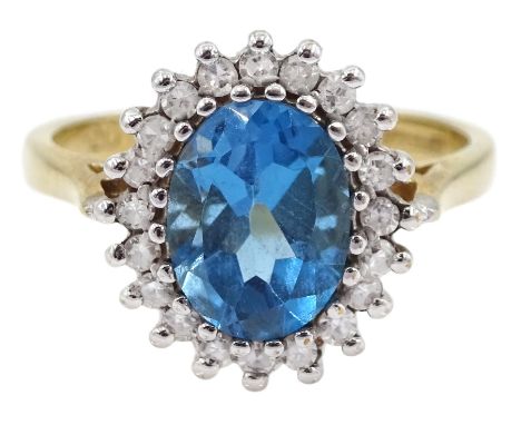 9ct gold diamond and oval blue topaz cluster ring, hallmarked