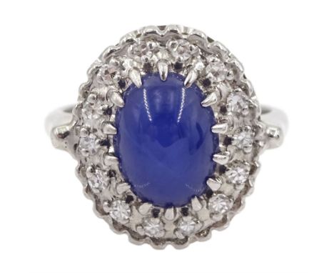 14ct white gold star sapphire and diamond cluster ring