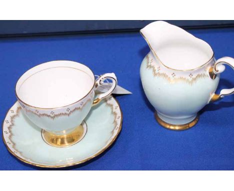 TUSCAN FINE CHINA TEA SERVICE
comprising twelve tea cups, twelve saucers, twelve side plates, two cake plates, two cream jugs