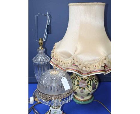 LOT OF THREE TABLE LAMPS
including a lamp with a ceramic base decorated with stylised floral motifs; together with a moulded 