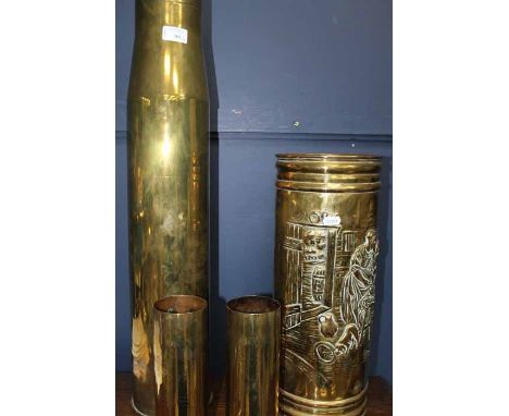 BRASS EMBOSSED STICK STAND AND THREE OTHER BRASS ITEMS