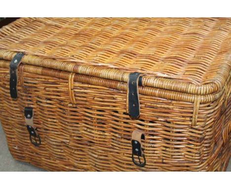 LARGE WICKER HAMPER
with leather buckle fastenings and carrying handles, approximately 74cm long