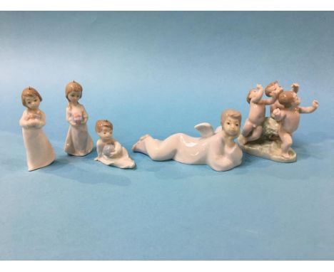 Six Lladro and Nao figures