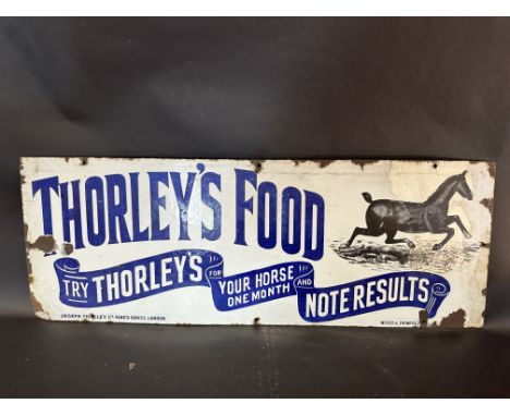 A Thorley's Food pictorial enamel advertising sign by Wood &amp; Penfold, with some old restoration, 33 x 12".&nbsp;