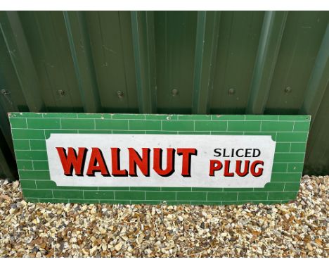 A Walnut Sliced Plug Cigarettes enamel advertising sign, 54 1/4 x 18". 