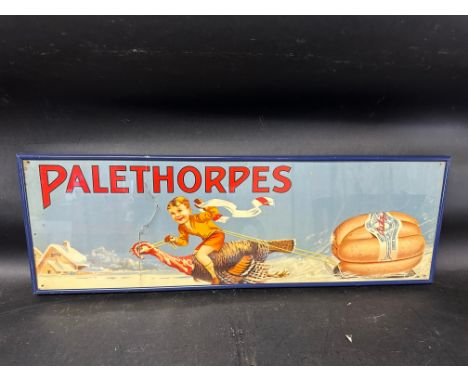 A Palethorpes Sausages advertisement depicting a snow scene of a boy riding a turkey pulling a sledge carrying sausages, fram