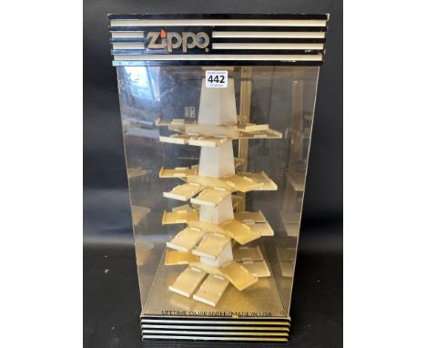A Zippo (lighters) shop counter display cabinet, rear door and central rotating column, made by Grimm Industries, Philadelphi