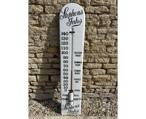 A Stephens' Inks enamel wall hanging thermometer, 12 1/2 x 63", white paint to edges where it's been hanging on a wall that's