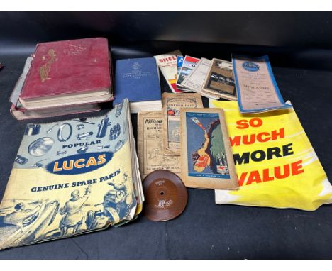 Two editions of The Dunlop Book, a 1958 RAC Guide and Handbook, a Lucas parts hanging chart, various maps inc. Shell, Mobiloi