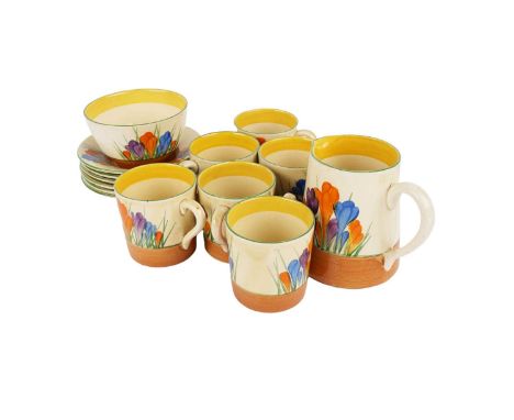 A Clarice Cliff ‘Crocus’ pattern part coffee service, circa early-mid 20th Century, decorated with stylised crocus flowers in
