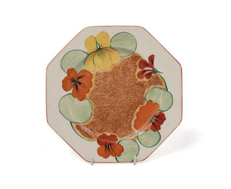 A Clarice Cliff Bizarre ‘Nasturtium’ pattern octagonal plate, circa early/mid 1930s, decorated with red, orange, and yellow f