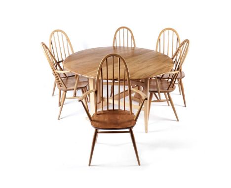 An Ercol Elm ‘Windsor’ gate leg breakfast table and suite of six ‘Quaker’ elm and beech dining chairs, comprising four elbow 