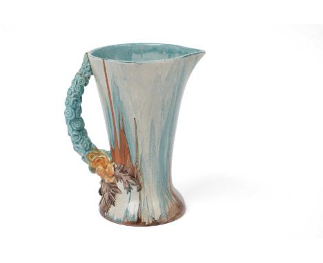 A Clarice Cliff Bizarre ‘My Garden’ pattern jug, circa 1930s, decorated in blues, oranges, and brown, with moulded foliate ha