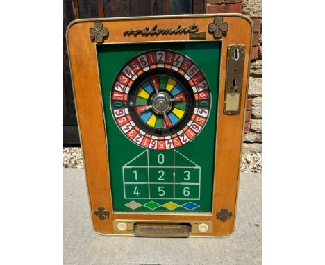 A 1960s German Roulomint Record slot machine, 20" wide x 27 3/4" tall x 9 3/4" deep.