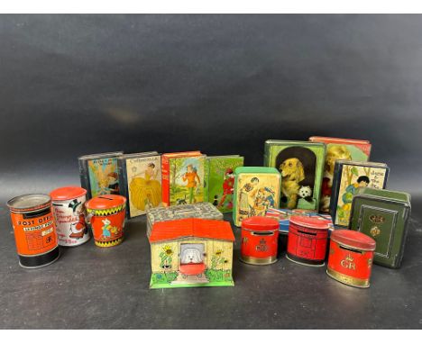 A collection of tin money boxes including fairy tales, advertising for Oxo cubes, W. Dunmore &amp; Son Ltd. Biscuits, Lyons' 