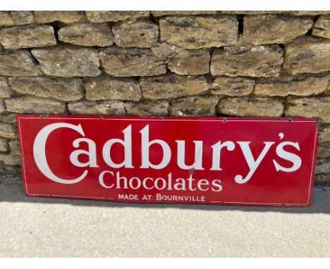 A large Cadbury's Chocolates enamel advertising sign by Cadbury Bournville England, 60 x 18", two patches of white paint touc