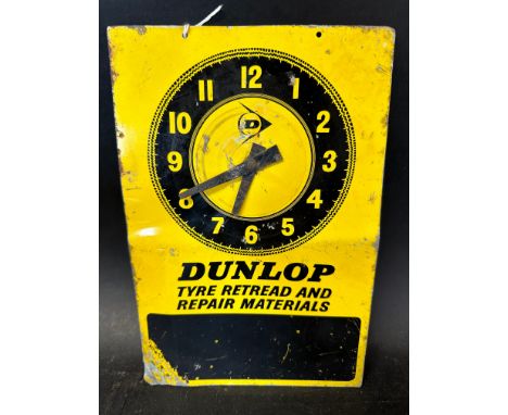 A Dunlop 'Tyre Retread and Repair Materials' garage/shop door clock, 9 3/4 x 6 1/2".