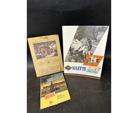Three showcards including a Palmer Bros 1956 complete advertising calendar depicting an Edwardian scene, 9 1/2 x 13", an Agfa