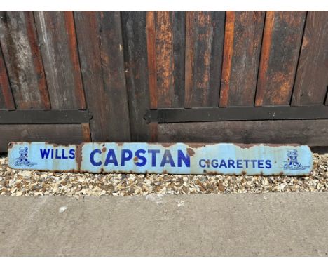 A Wills' Capstan Cigarettes enamel advertising sign, 60 x 6".