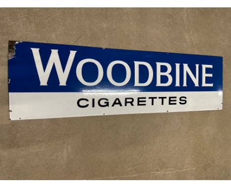 A Woodbine Cigarettes enamel advertising sign, 60 x 17 1/4".