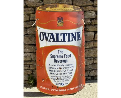 A rare Ovaltine enamel advertising sign in the shape of an Ovaltine product tin promoting its vitamin qualities, 'The Supreme