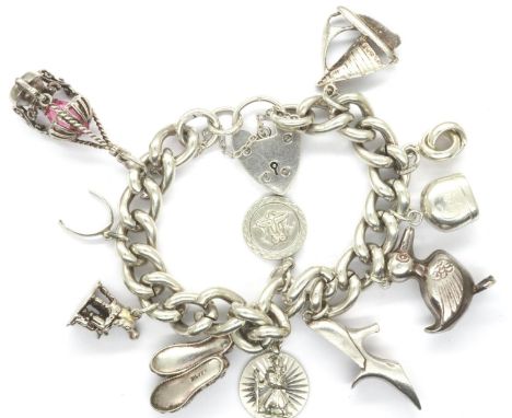 Heavy gauge 925 silver charm bracelet with hallmarked padlock clasp and eleven charms, bracelet L: 20 cm. P&amp;P Group 1 (£1