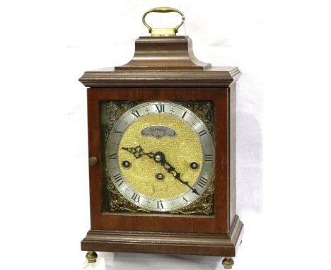 Walnut cased Warmink mantle clock with brass decoration in relief, H: 31 cm, working at lotting. P&amp;P Group 3 (£25+VAT for