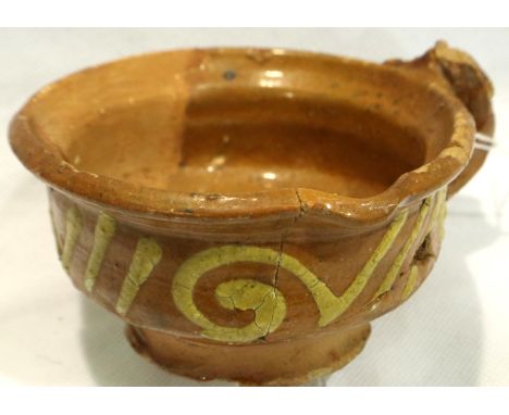 A Song Dynasty glazed and slip-decorated vessel with single handle, restored throughout, D: 10 cm, H: 5 cm. P&amp;P Group 1 (