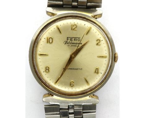 FERO FELDMANN: gents manual wind wristwatch, with circular champagne dial, 17 jewel movement and steel bracelet with deployme