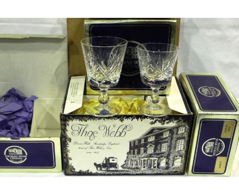 Six boxed Thomas Webb crystal goblets and six boxed wine glasses, in good condition. P&amp;P Group 3 (£25+VAT for the first l