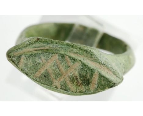Roman bronze ring with engraved design, L: 14 mm. P&amp;P Group 0 (£5+VAT for the first lot and £1+VAT for subsequent lots) 