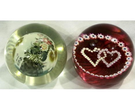 Reverse painted Chinese paperweight, depicting kittens and flowers and a Caithness Luckenbooth Millefiori paperweight, larges