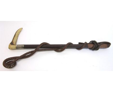 A GENT'S HUNTING WHIP with horn grip, plated collar marked 'Swaine', plaited shaft and leather thong