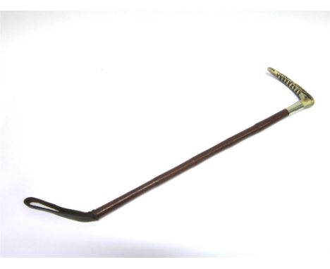 A LADY'S HUNTING WHIP with horn grip, the plated collar engraved with initial 'R' and with leather covered shaft