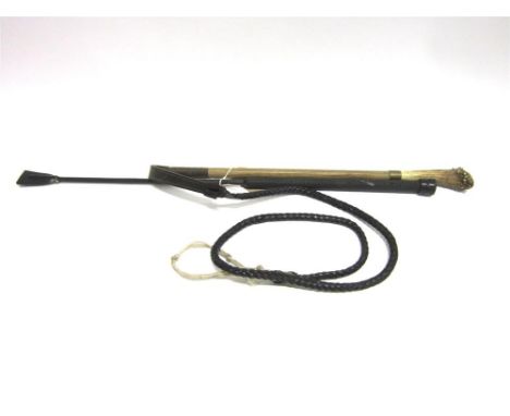 A HUNTING WHIP  with long horn grip and plaited leather thong and a rubber riding crop (2)