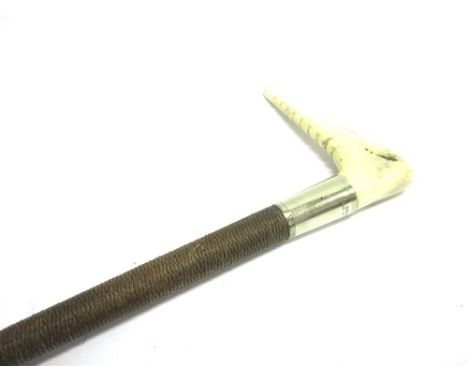 A GENT'S HUNTING WHIP with grip, plated collar engraved 'Swaine' and plaited shaft