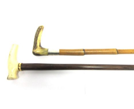 A BAMBOO WALKING CANE with horn grip and silver collar; and another stick with a bone grip (2)