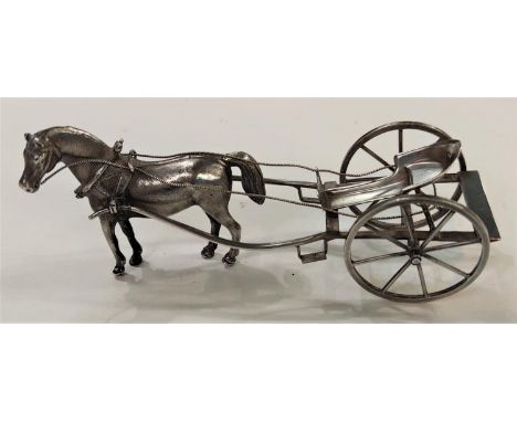 A miniature white metal model of a pony and trap 