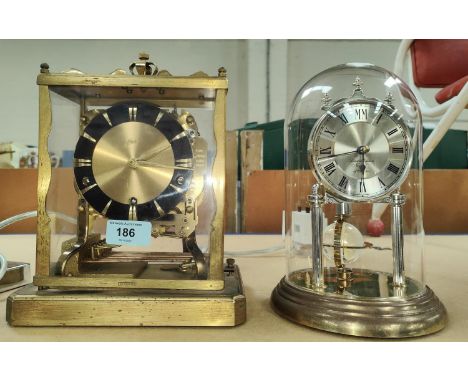 A 1950's gilt metal striking mantle clock by Shatz + a 400 day clock 