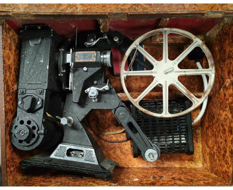 A vintage Pathescope Cine Projector in case 
