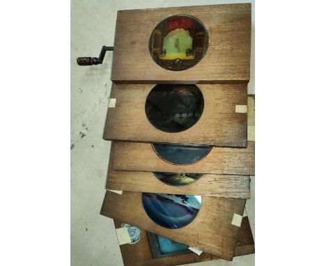 A selection of 19th century mahogany and glass magic lantern 'slipping' slides, some of Dutch interest.&nbsp;&nbsp;Just one h