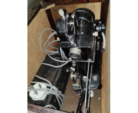 A vintage Pathescope Cine Projector in case 