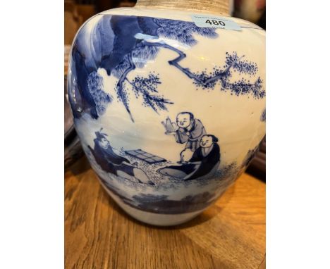 A large blue & white ginger jar decorated with scenes of scholars, a pierced wood lid, on a hardwood stand (ginger jar neck a