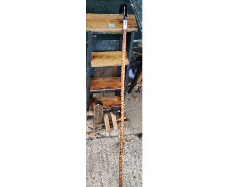 A wooden display ladder, a shepherd's style crook, two wooden clamps 