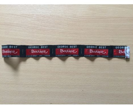 1969/70 George Best Boutique Item: Original cloth strip from his clothes shop. Could potentially be 5 labels to go into garme