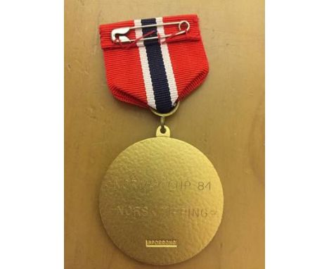 Medal Presented To George Best: Inscribed Norway Cup 84 Norsk Tipping. This item was sold by George Bests former wife Alex vi