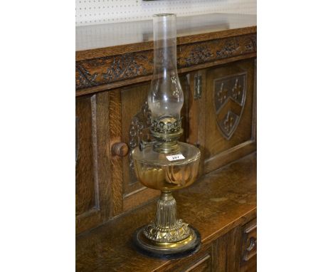 A Victorian brass oil lamp